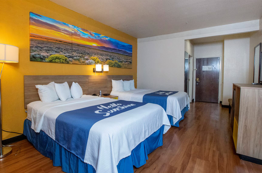 Comfortable guest room at Days Inn & Suites Houston North/Aldine